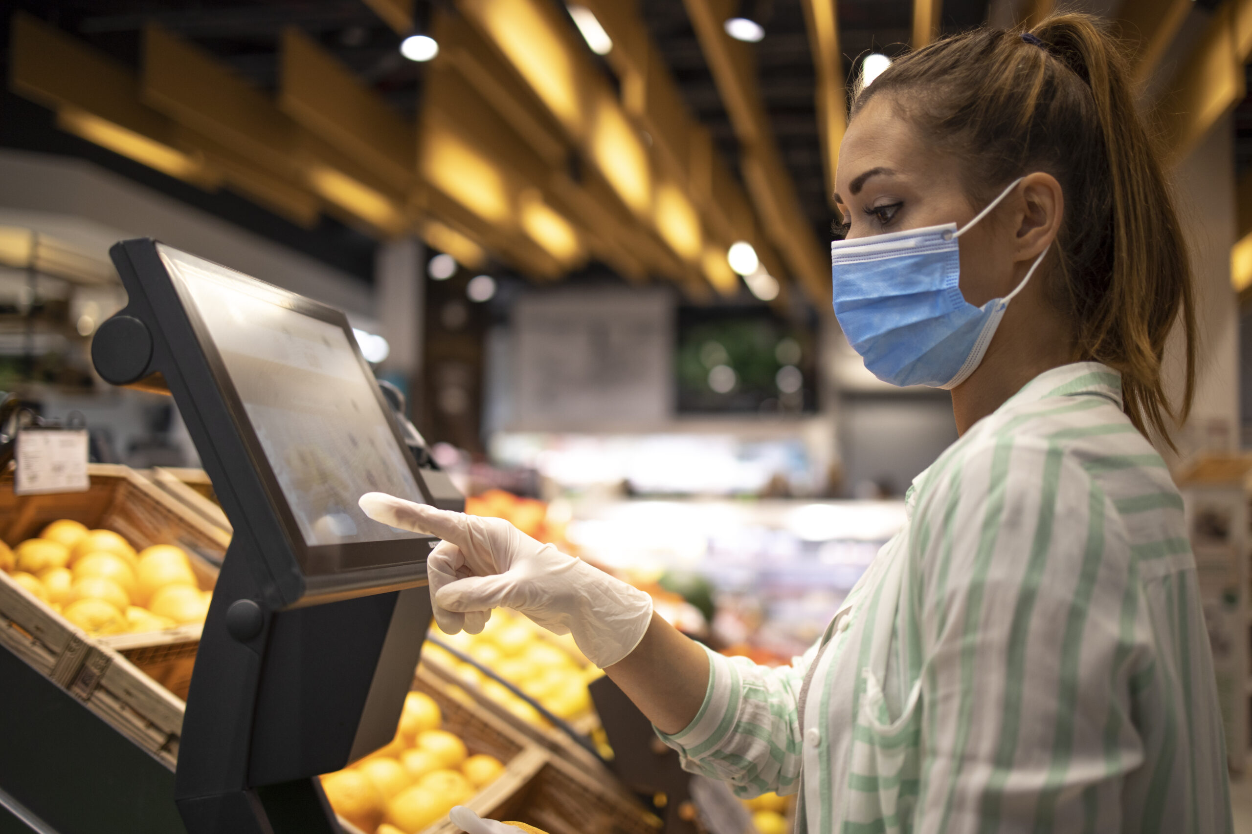 Buying food at supermarket during corona virus global pandemic.